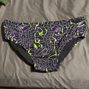 Speedo Swim Briefs in Black, Purple, and Green